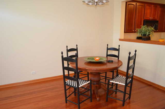 2548 Congress Avenue Aurora, IL 60503 - Photo 5 of 22 a view of a dining room with furniture and wooden floor