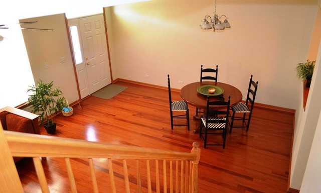 2548 Congress Avenue Aurora, IL 60503 - Photo 6 of 22 a view of a dining room with furniture and wooden floor