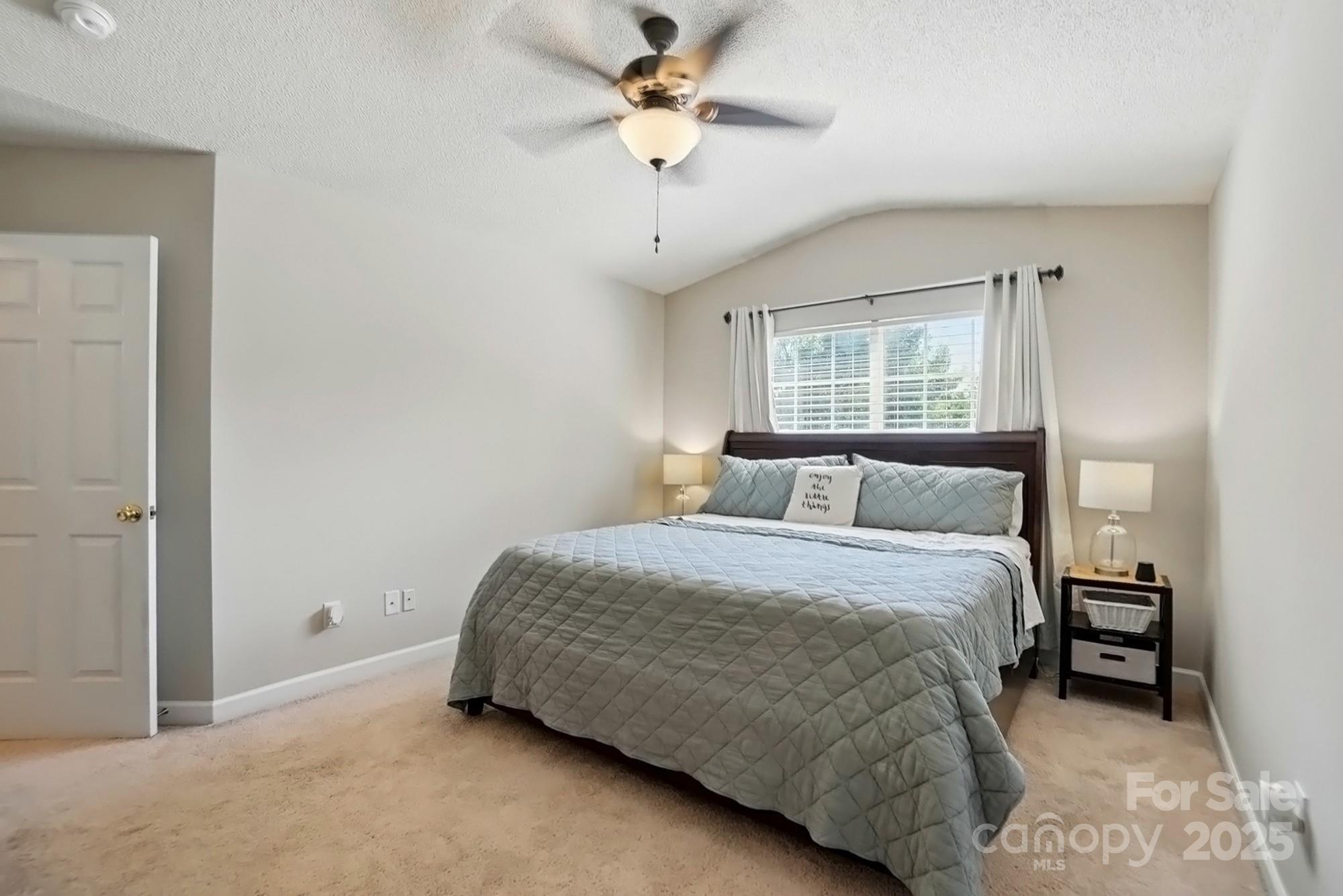 820 Settlement Street Clover, SC 29710 - Photo 14 of 29 a bedroom with a bed and window