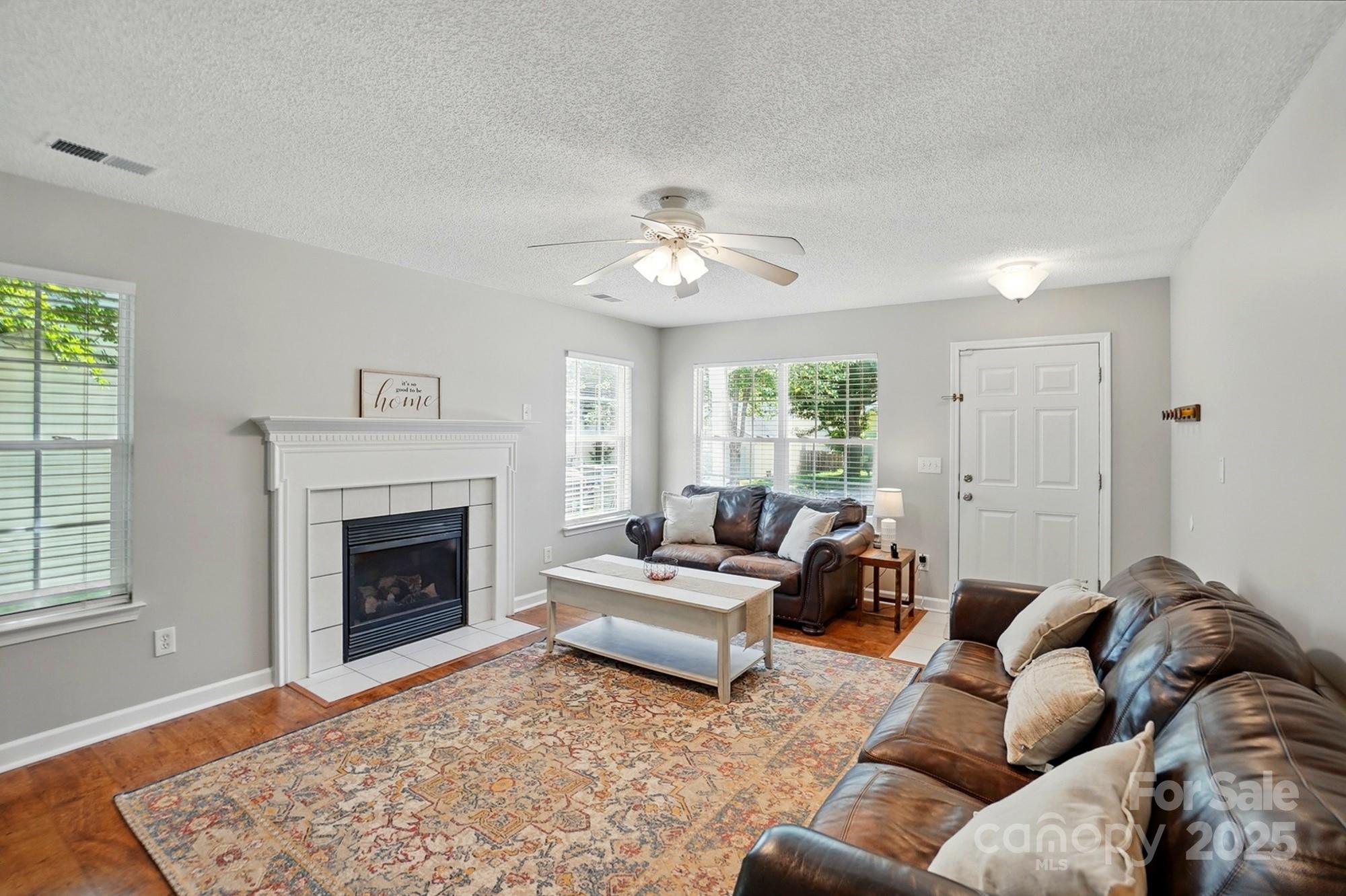 820 Settlement Street Clover, SC 29710 - Photo 5 of 29 a living room with furniture and a fireplace