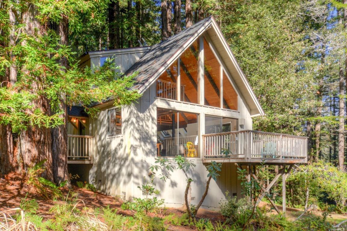 36529 East Ridge Road The Sea Ranch, CA 95497 - Photo 1 of 1 a view of a house with backyard and sitting area