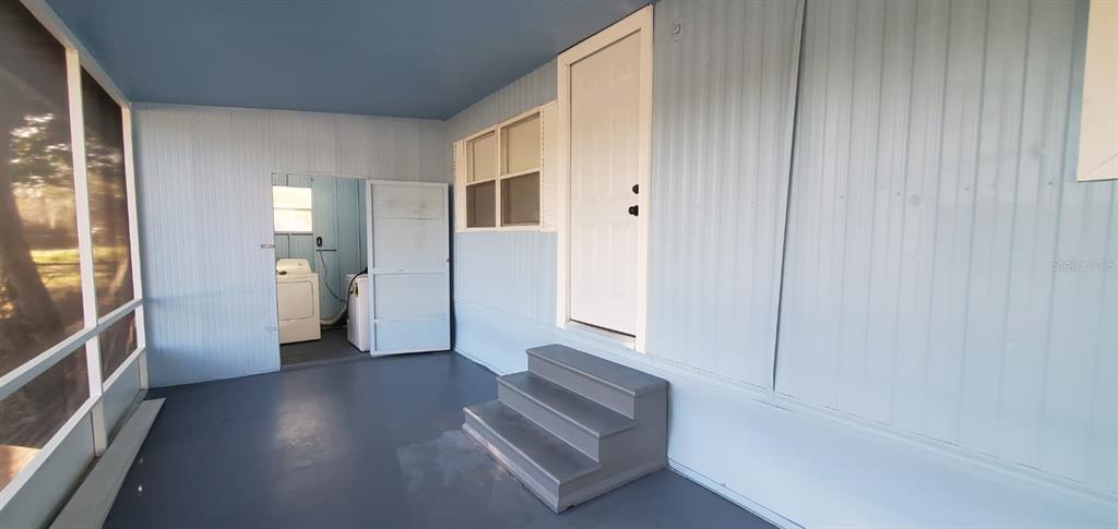 4305 Tony Street Orlando, FL 32808 - Photo 17 of 23 a view of an empty room and a gallery