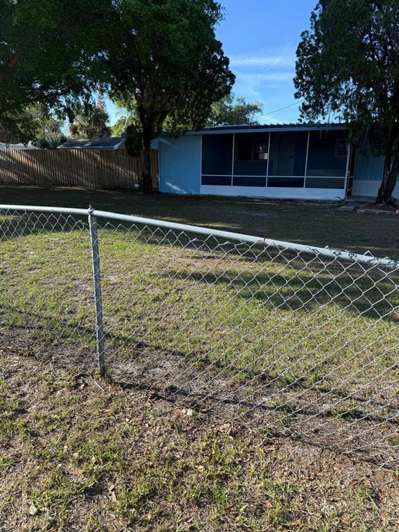 4305 Tony Street Orlando, FL 32808 - Photo 22 of 23 a view of a backyard