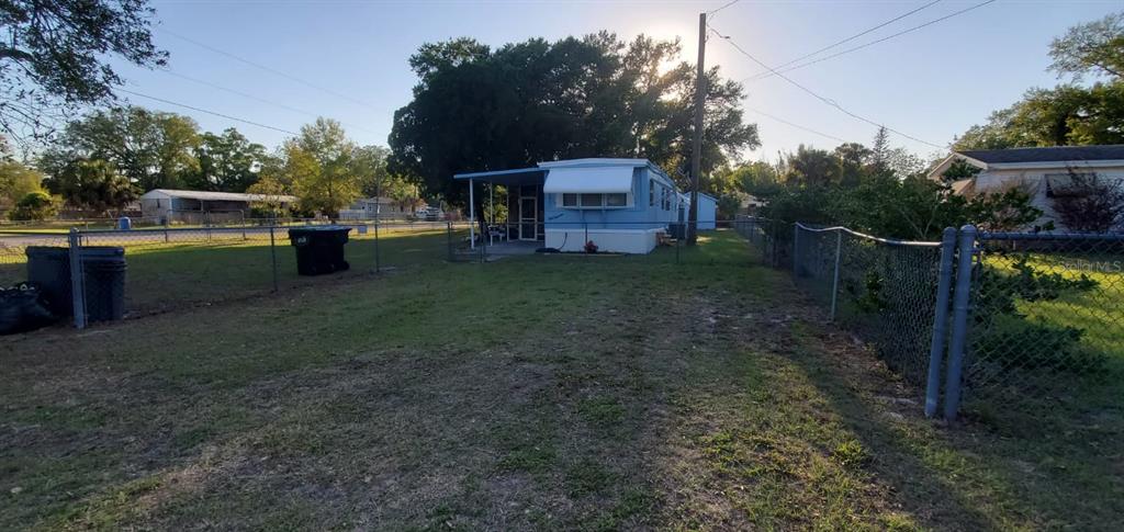 4305 Tony Street Orlando, FL 32808 - Photo 23 of 23 a view of a house with backyard