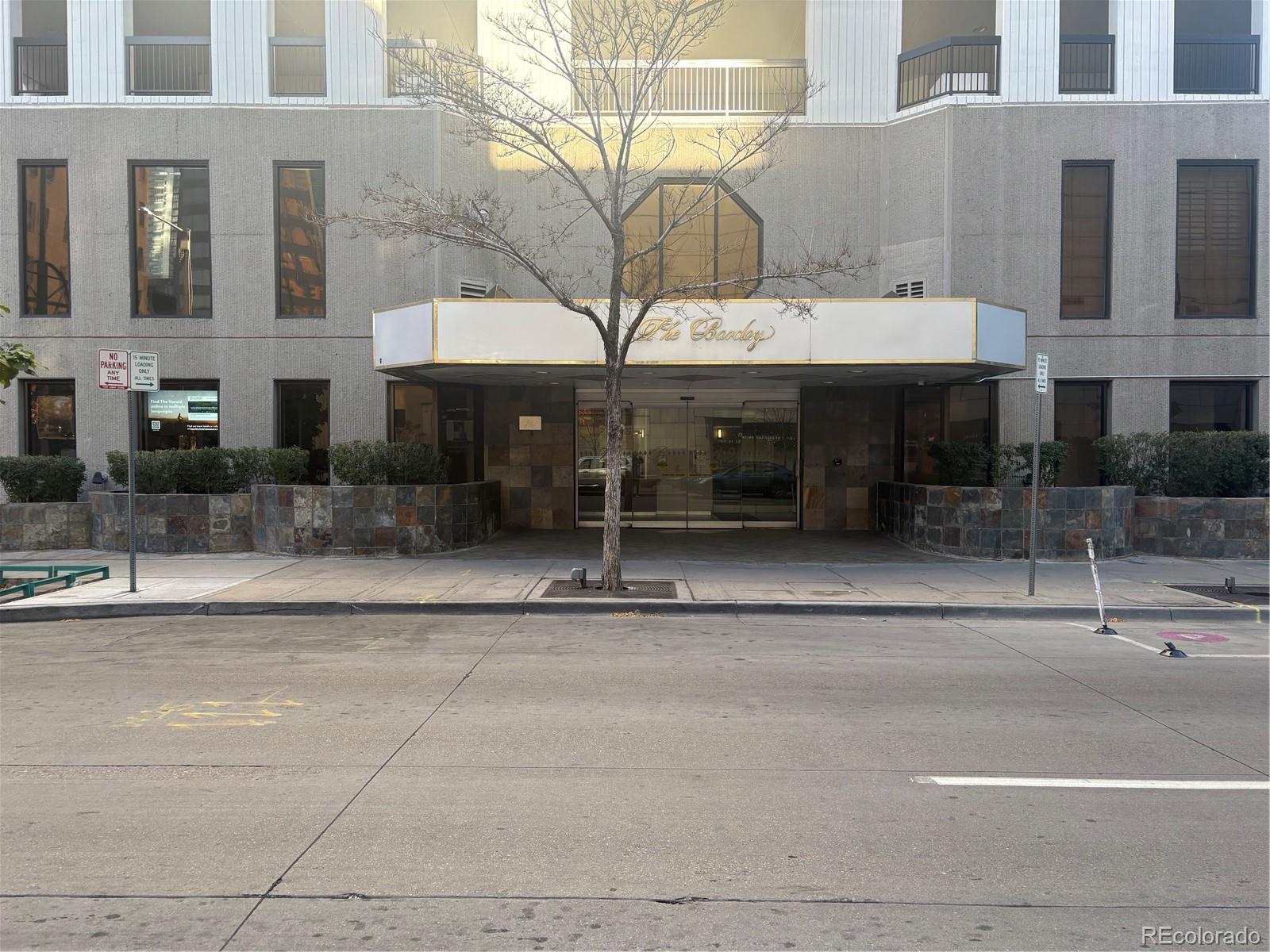 a view of a building with a terrace