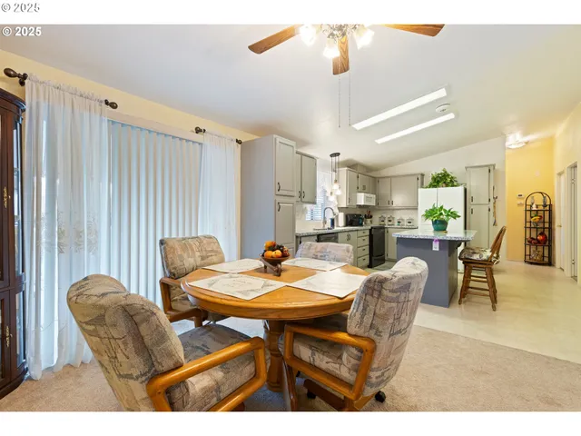 a view of a dining room with furniture
