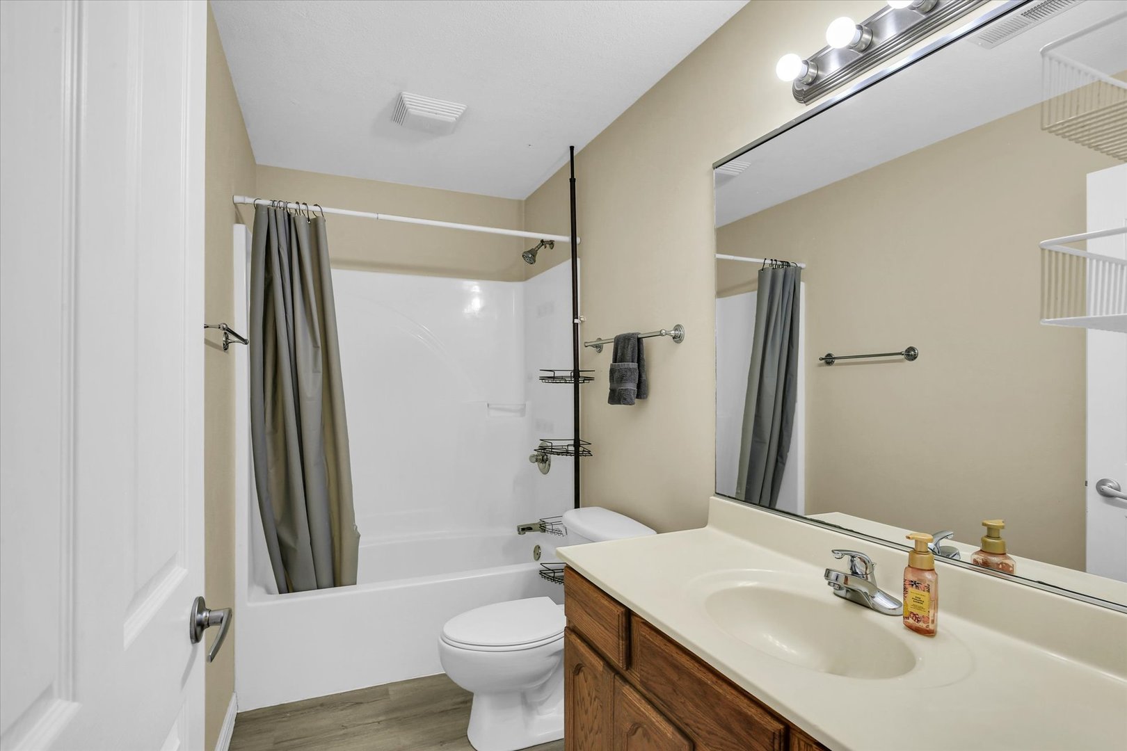 3715 Boulder Ridge Drive Champaign, IL 61822 - Photo 18 of 29 a bathroom with a sink toilet and shower