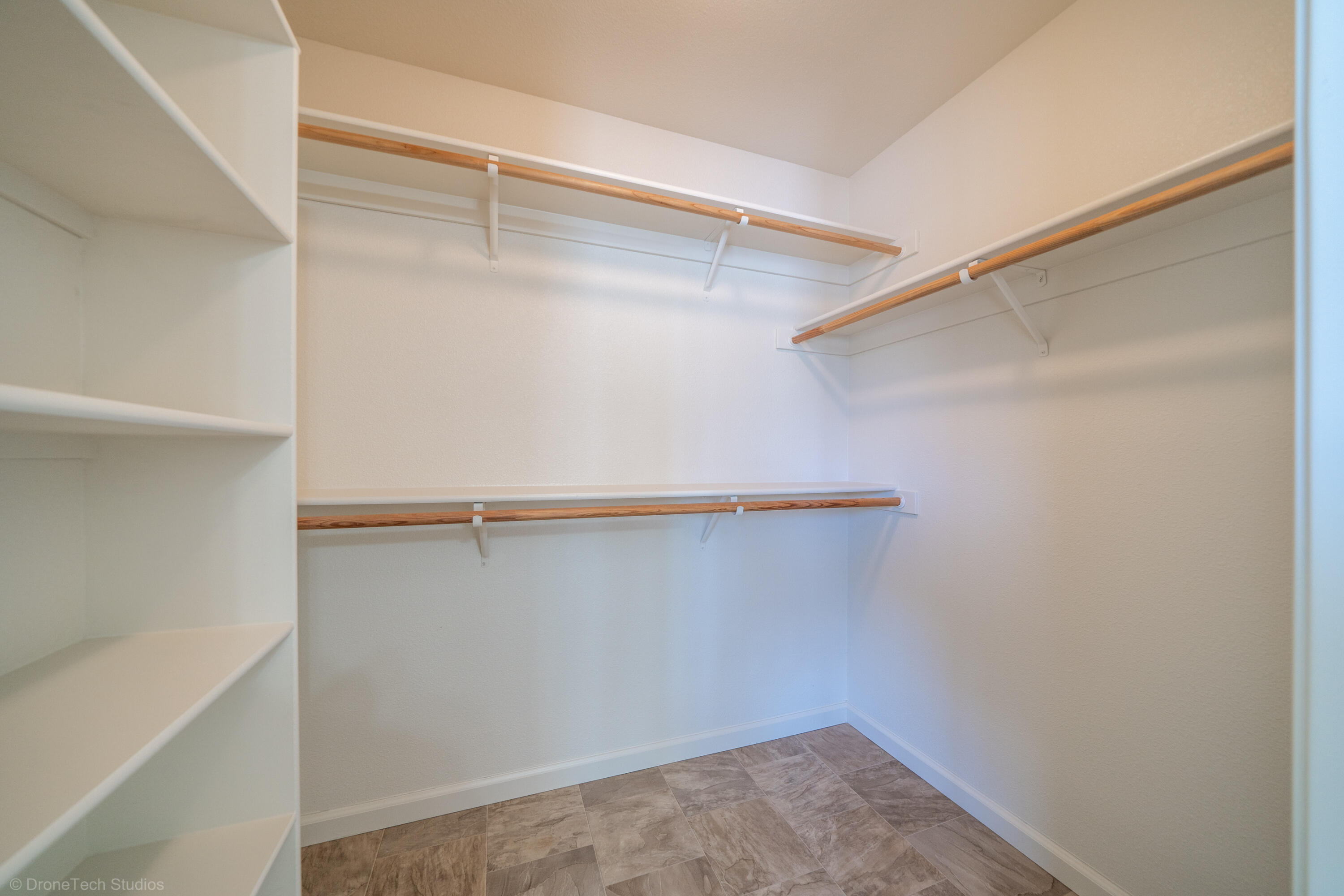 1764 Capistrano Walk Redding, CA 96003 - Photo 14 of 34 a view of an empty walk in closet