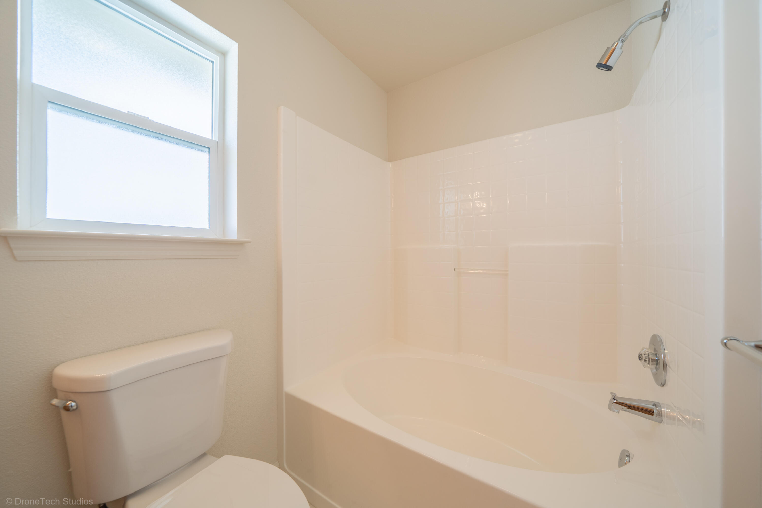 1764 Capistrano Walk Redding, CA 96003 - Photo 17 of 34 a white toilet sitting next to a bath tub