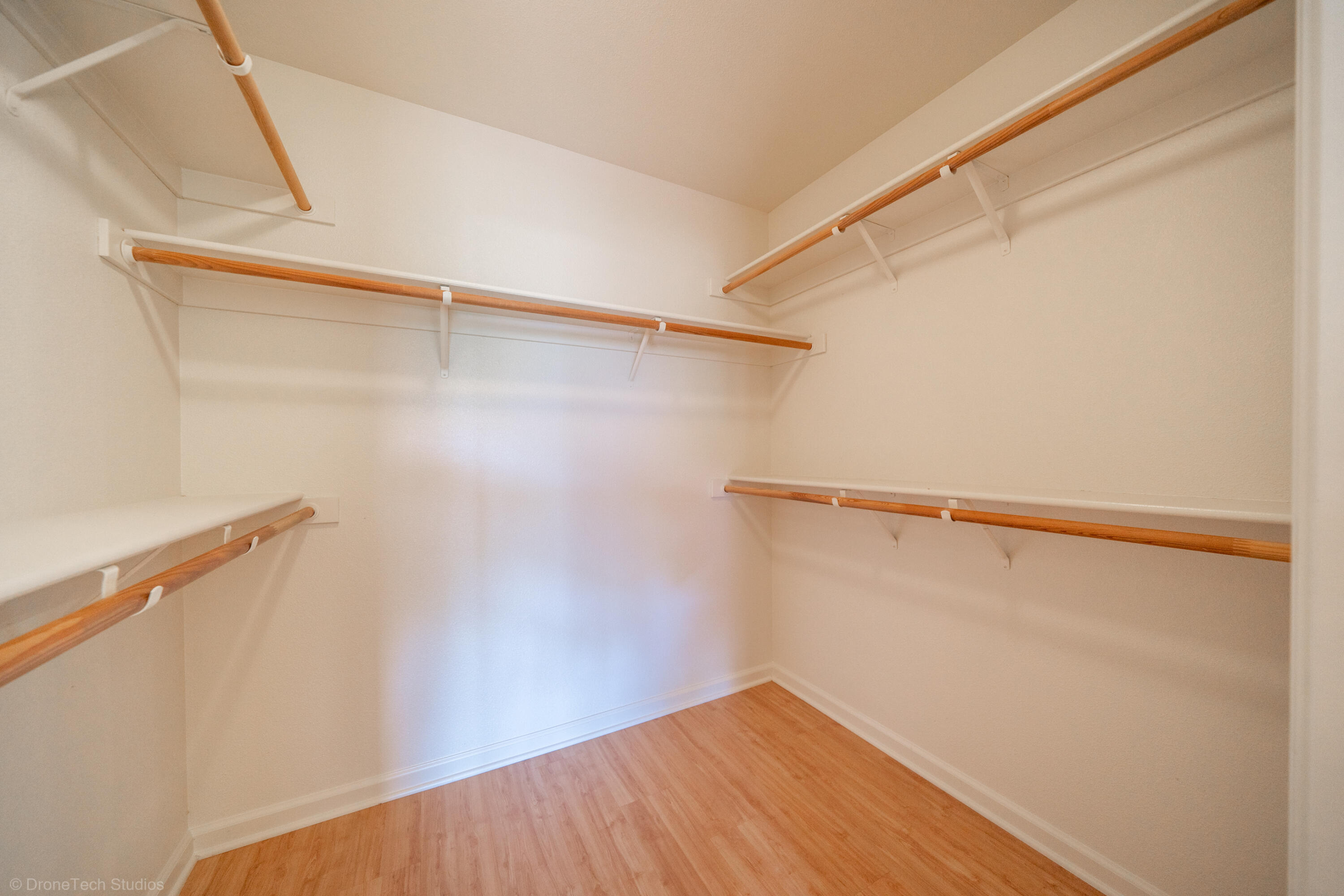 1764 Capistrano Walk Redding, CA 96003 - Photo 23 of 34 a view of walk in closet with empty racks