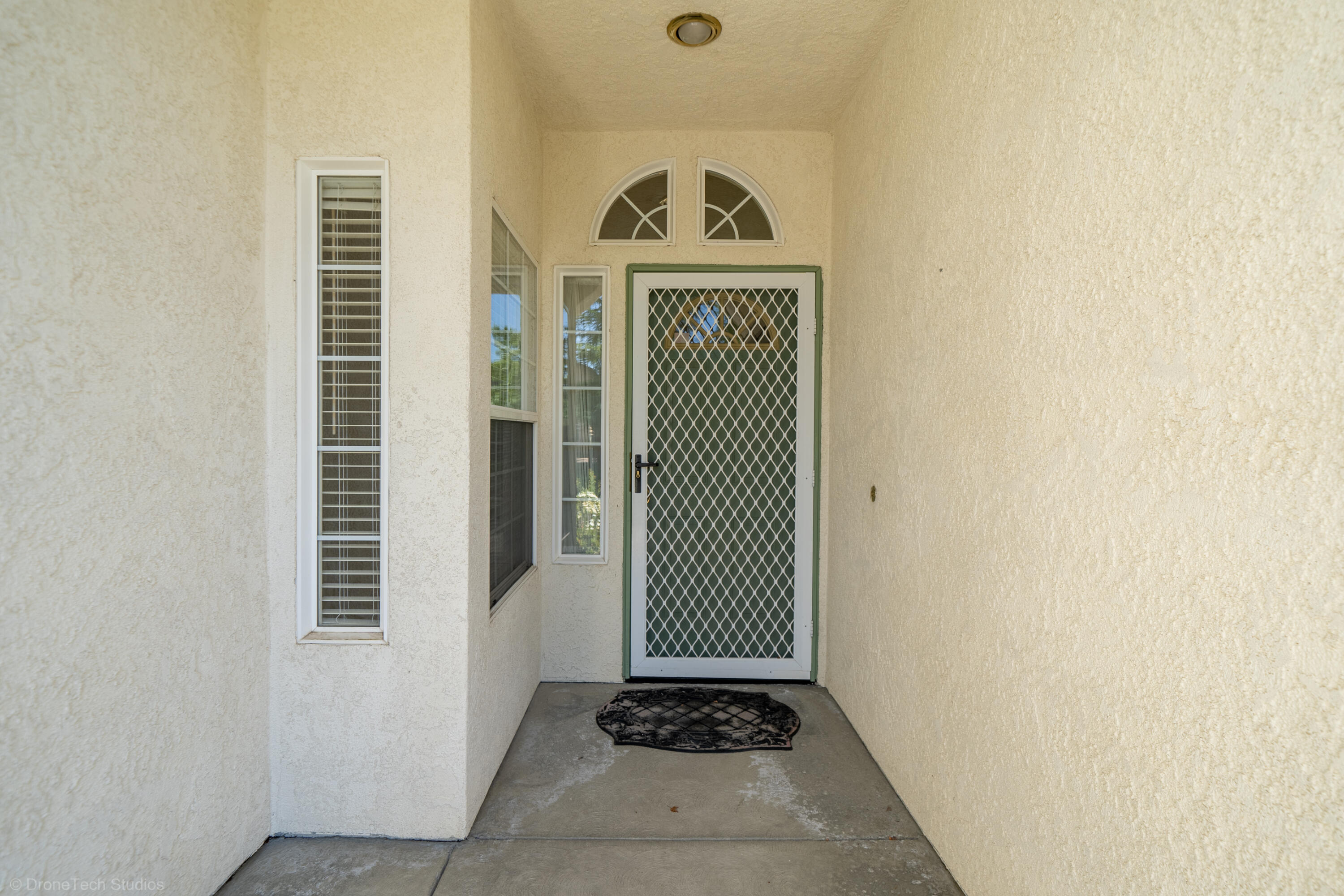 1764 Capistrano Walk Redding, CA 96003 - Photo 3 of 34 a view of front door of house