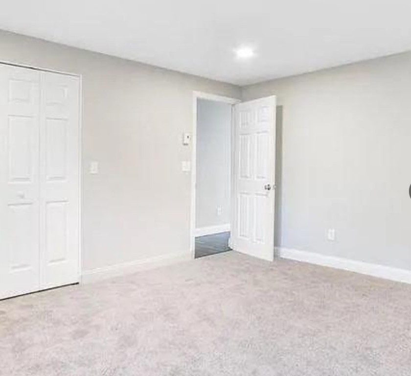 4162 Post Road, Unit 3 Warwick, RI 02818 - Photo 15 of 20 Lower level bedroom