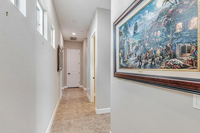 a view of a swimming pool with an outdoor space and seating area