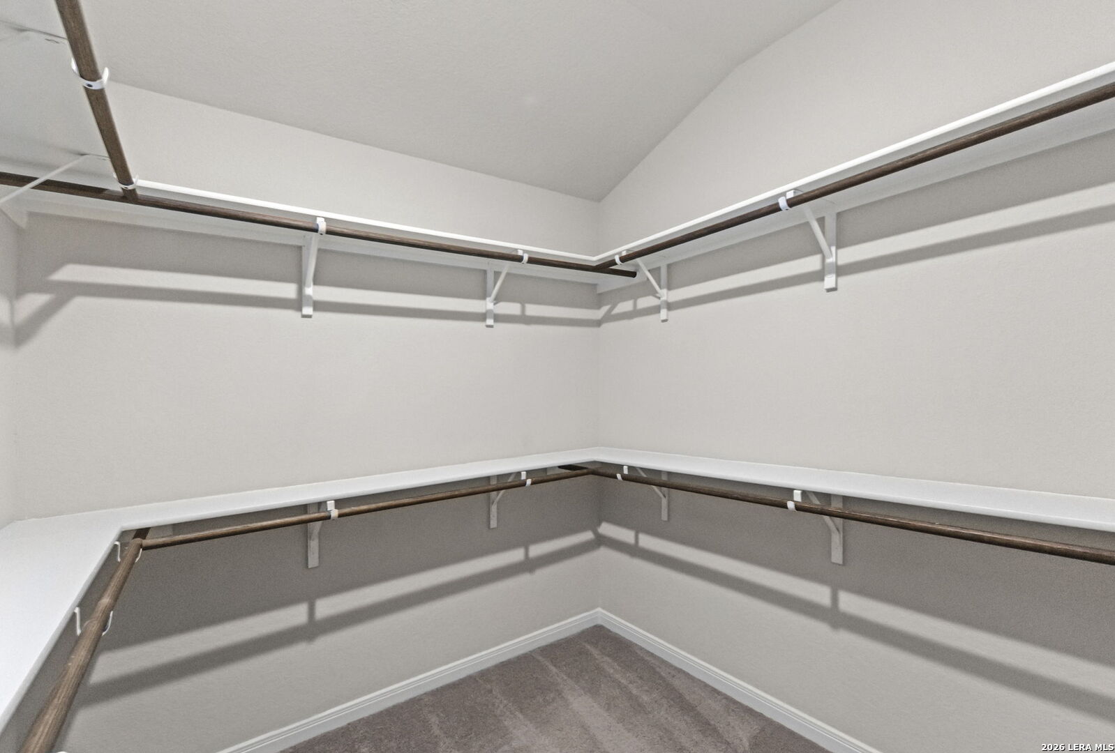12221 Icon Ridge San Antonio, TX 78253 - Photo 19 of 46 a view of a room with rack on the wall