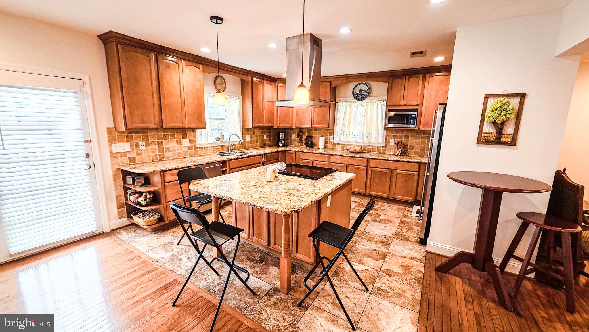1807 Anderson Road Falls Church, VA 22043 - Photo 8 of 33 Inviting kitchen with warm wood tones.