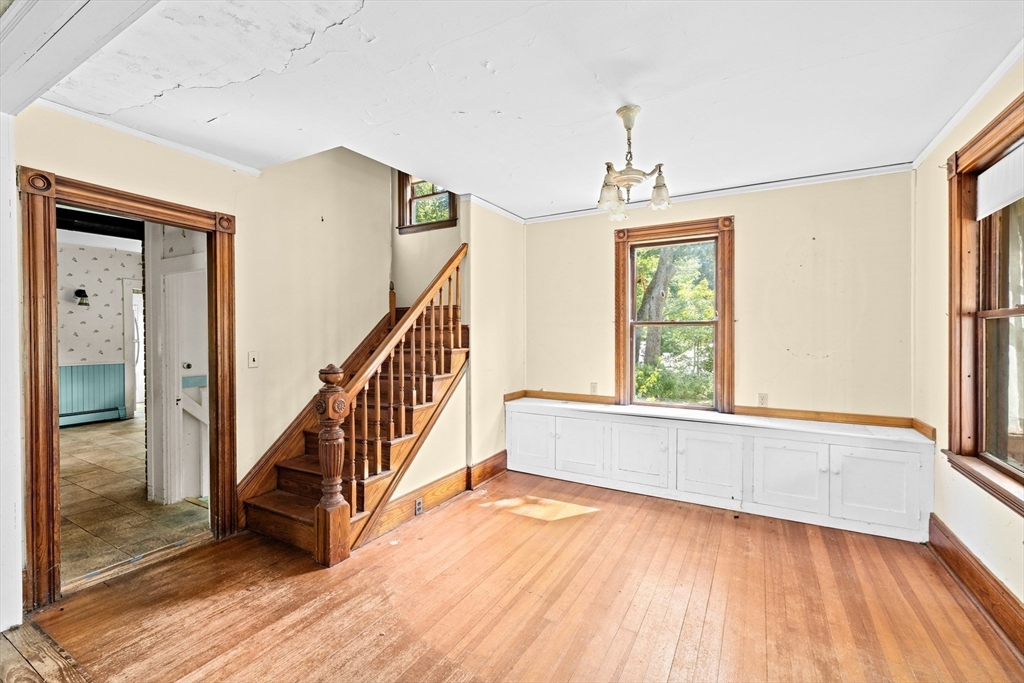 62 High Street Norwell, MA 02061 - Photo 15 of 37 a view of an entryway with wooden floor and windows
