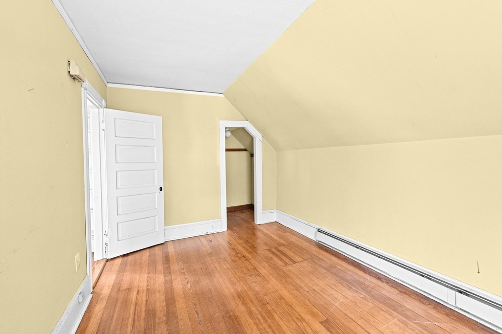 62 High Street Norwell, MA 02061 - Photo 19 of 37 a view of an empty room with wooden floor