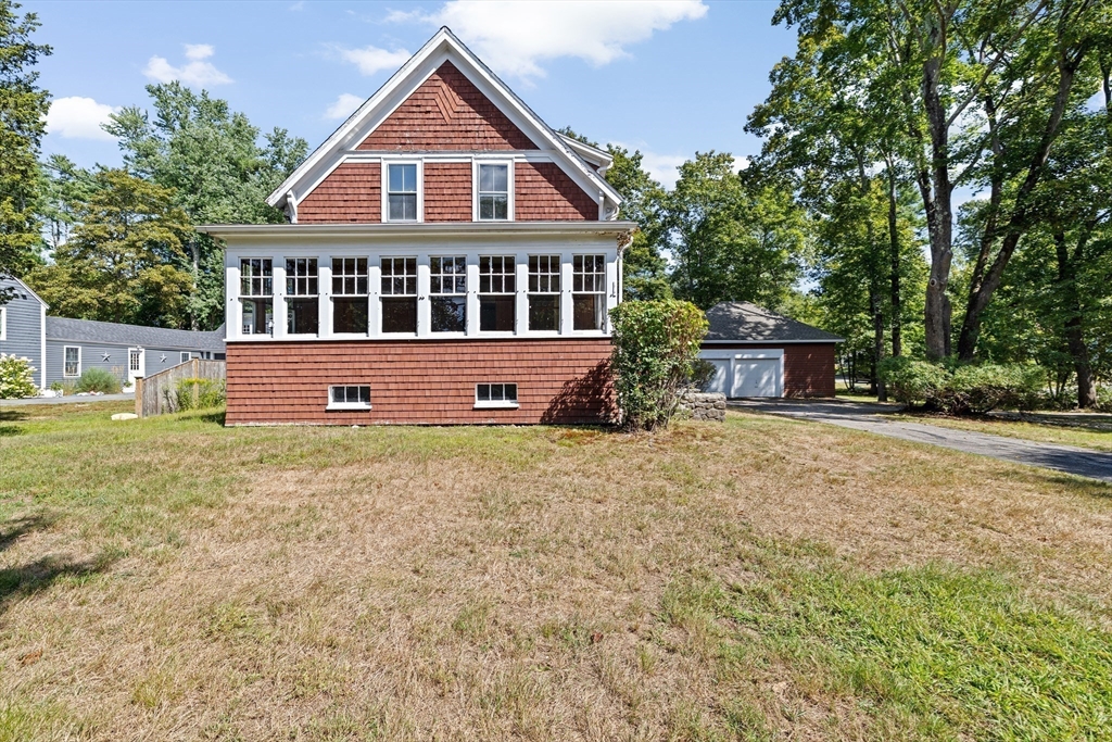 62 High Street Norwell, MA 02061 - Photo 30 of 37 a front view of a house with a yard