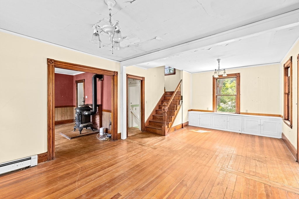 62 High Street Norwell, MA 02061 - Photo 3 of 37 a view of an empty room with window gym equipment
