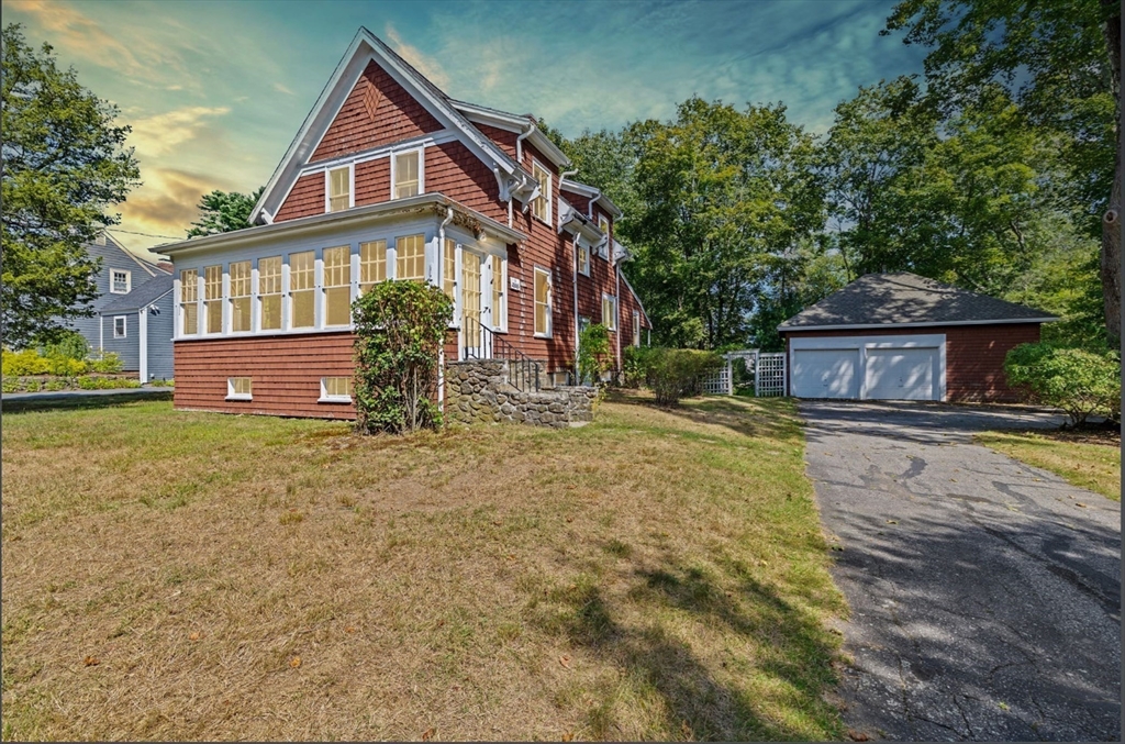 62 High Street Norwell, MA 02061 - Photo 31 of 37 a front view of a house with a yard