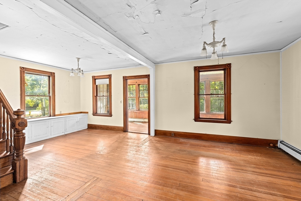 62 High Street Norwell, MA 02061 - Photo 4 of 37 a view of livingroom with hardwood floor and window