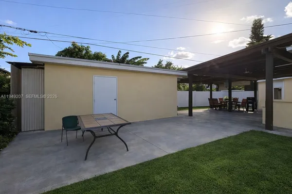 a view of a porch with a yard