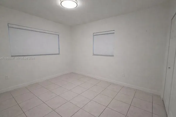 a view of a backyard of a house