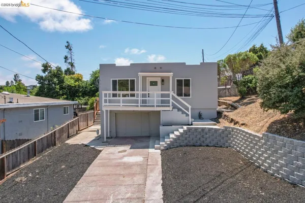 a house view with a outdoor space
