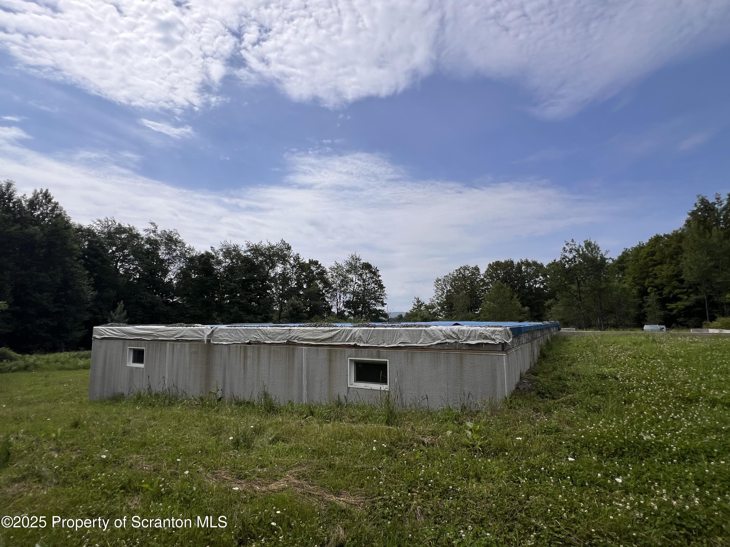 742 May Road Union Dale, PA 18470 - Photo 16 of 19 a view of a backyard