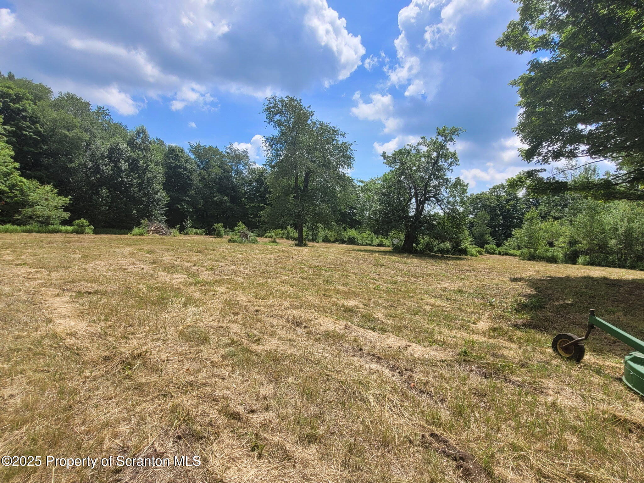 742 May Road Union Dale, PA 18470 - Photo 9 of 19 a view of a yard with a house