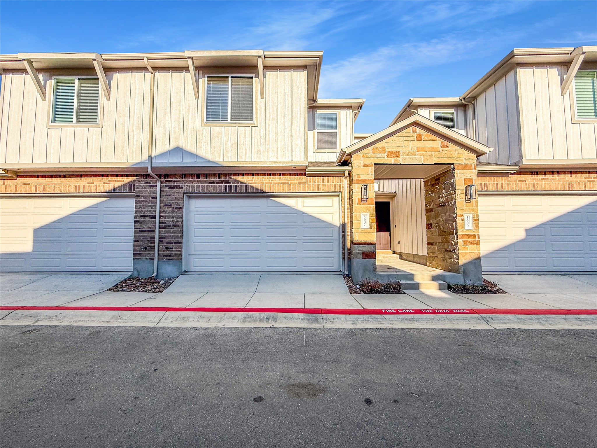 5607 Mobeetie Loop Bee Cave, TX 78738 - Photo 1 of 21 2-story townhome with 2-car garage