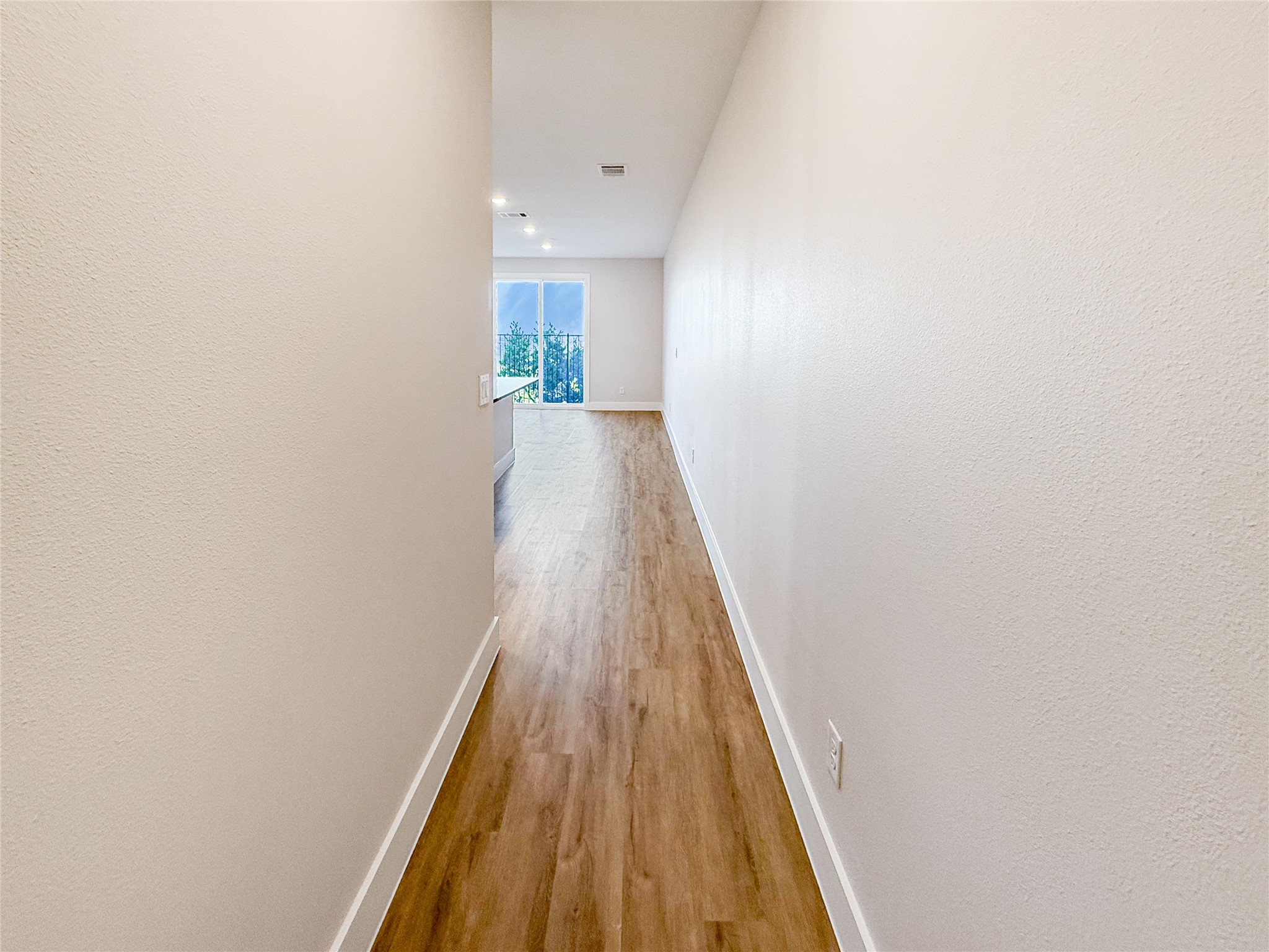 5607 Mobeetie Loop Bee Cave, TX 78738 - Photo 3 of 21 hallway leading to the main living area