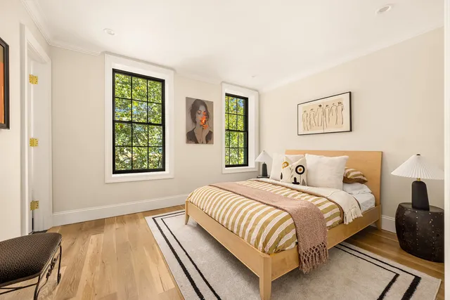 a bathroom with a granite countertop sink a toilet and bathtub