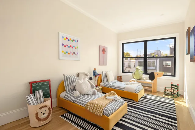a bathroom with a sink a toilet and shower curtain