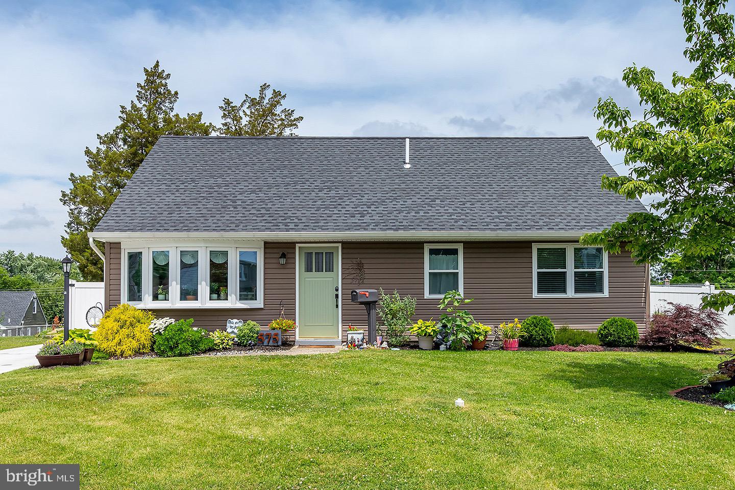 575 Allegheny Road Wenonah, NJ 08090 - Photo 1 of 23 front view of a house with a garden
