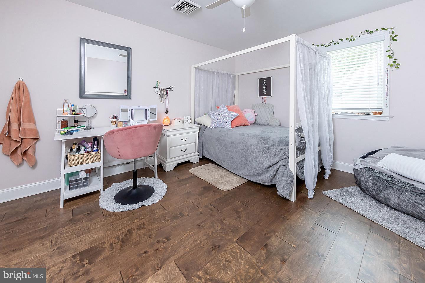 575 Allegheny Road Wenonah, NJ 08090 - Photo 12 of 23 a bedroom with furniture and a window