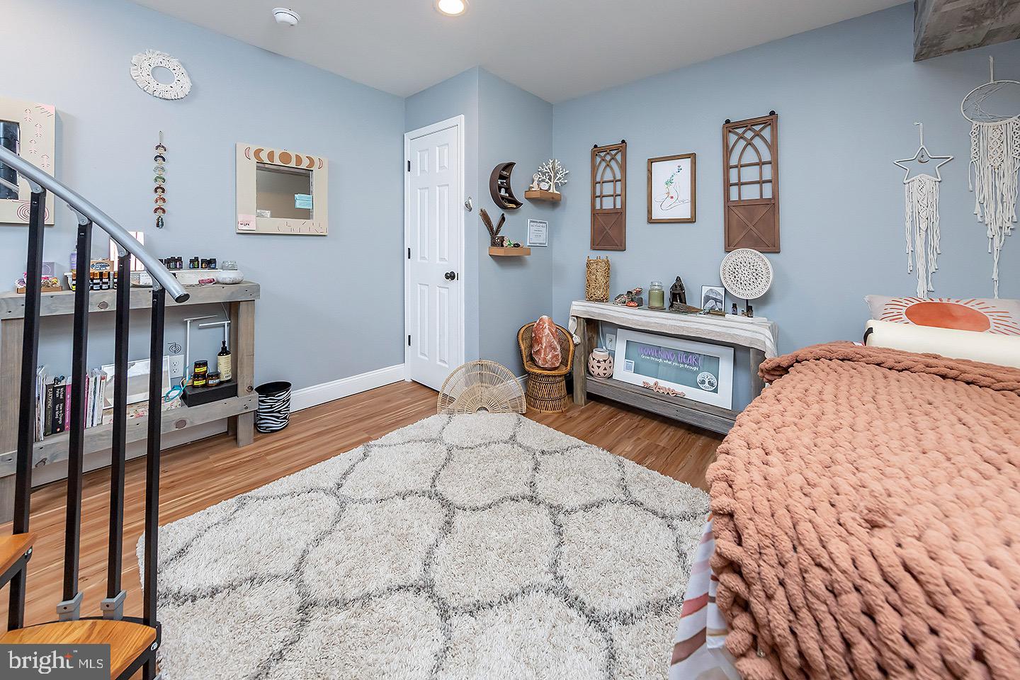 575 Allegheny Road Wenonah, NJ 08090 - Photo 18 of 23 a bedroom with a bed and a table in it