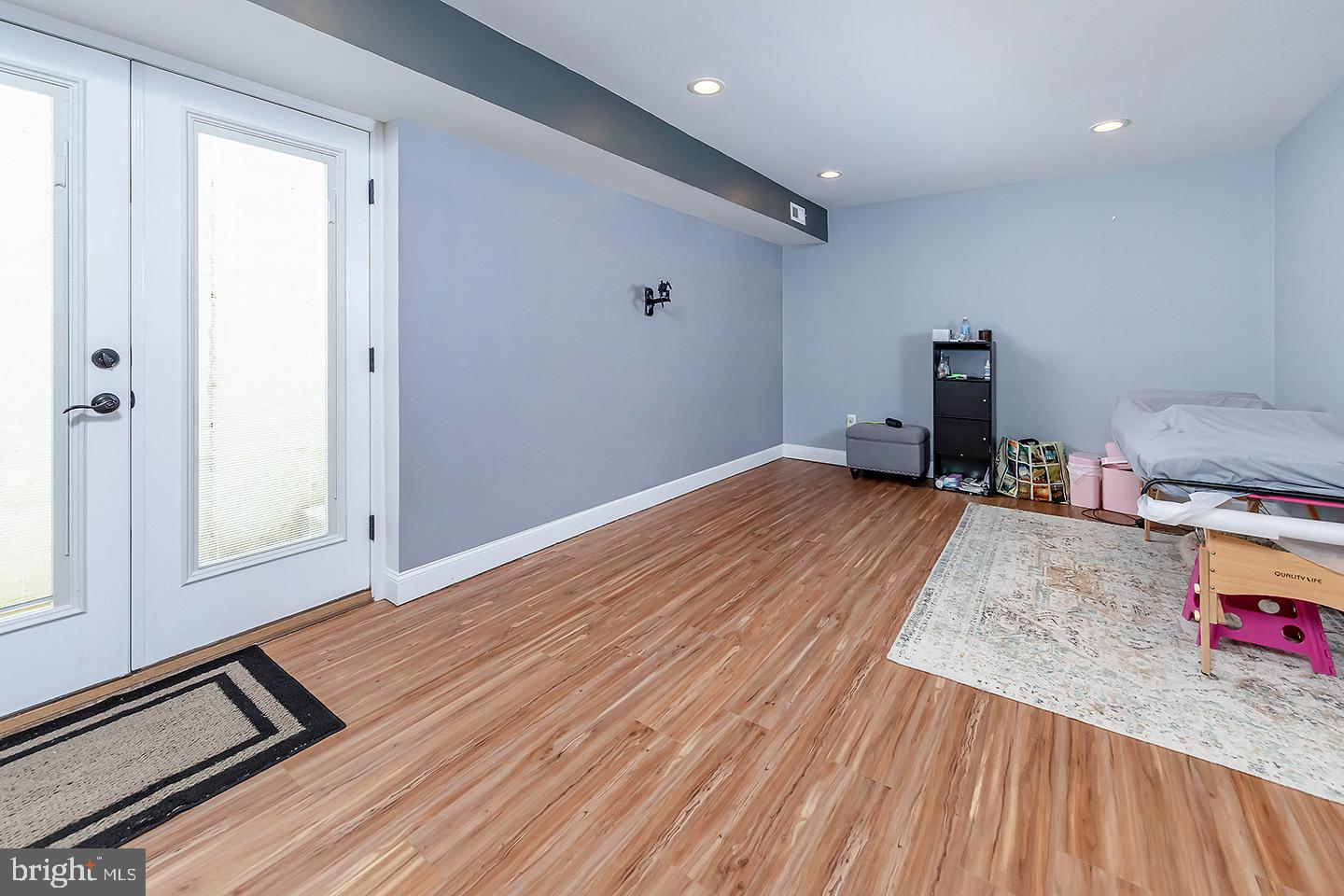 575 Allegheny Road Wenonah, NJ 08090 - Photo 19 of 23 a view of a room with wooden floor and air conditioner