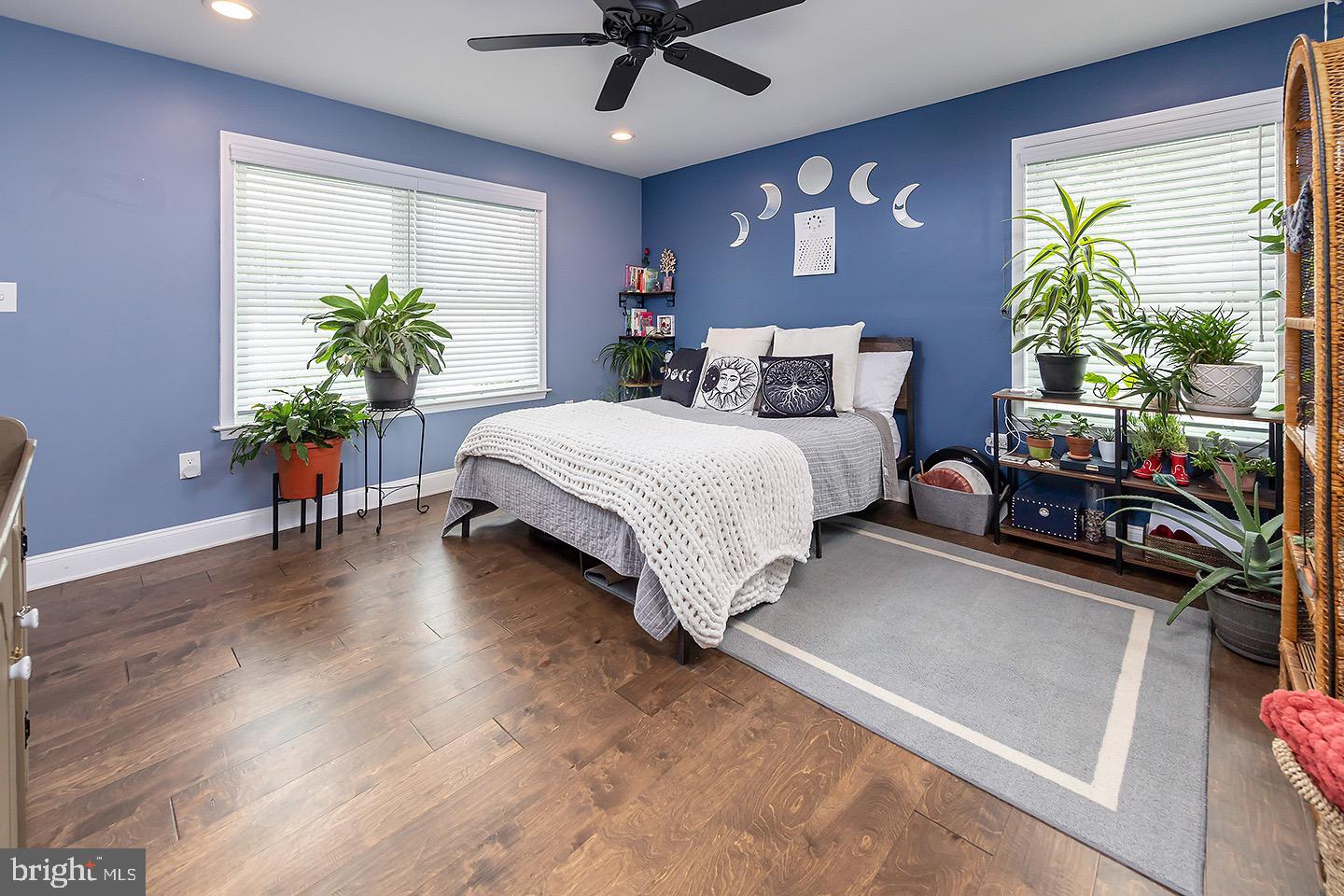 575 Allegheny Road Wenonah, NJ 08090 - Photo 10 of 23 a bed room with a bed and a potted plant