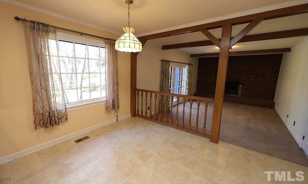 2905 Old Orchard Road Raleigh, NC 27607 - Photo 8 of 27 a view of an empty room with a window