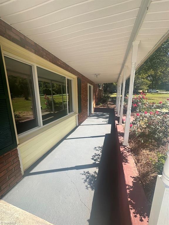 3165 Wide Country Road Tobaccoville, NC 27040 - Photo 7 of 35 Front Porch