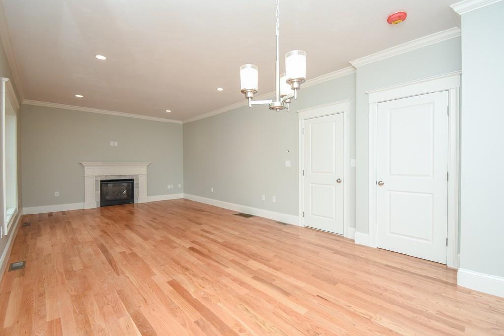 72 Bethany Road Framingham, MA 01702 - Photo 19 of 41 a view of empty room with wooden floor
