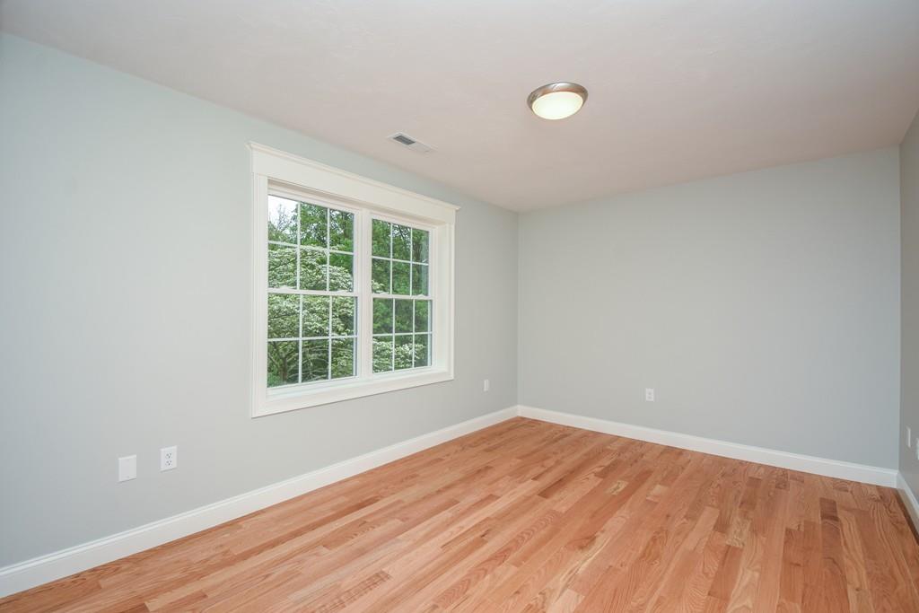 72 Bethany Road Framingham, MA 01702 - Photo 25 of 41 wooden floor in an empty room with a window