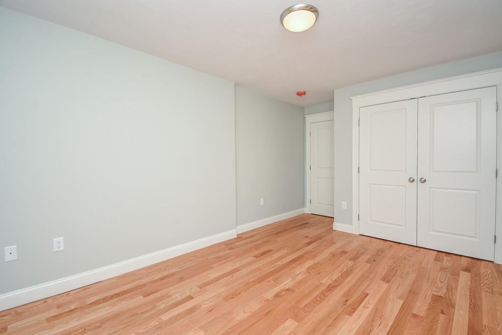 72 Bethany Road Framingham, MA 01702 - Photo 27 of 41 a view of empty room with wooden floor