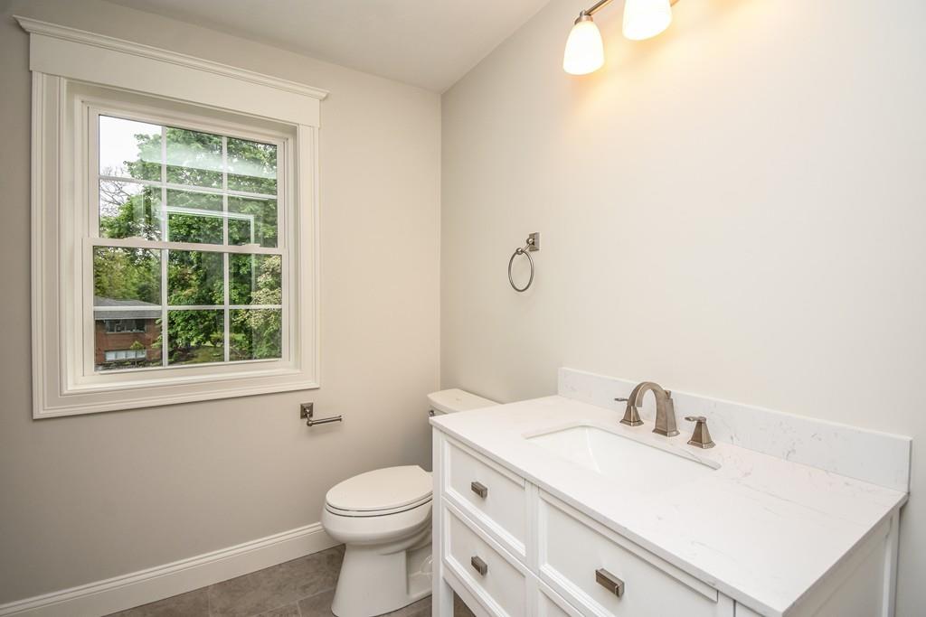 72 Bethany Road Framingham, MA 01702 - Photo 34 of 41 a bathroom with a sink a toilet and a window