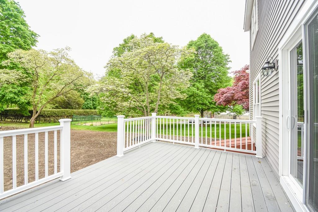 72 Bethany Road Framingham, MA 01702 - Photo 7 of 41 a view of backyard with a large trees