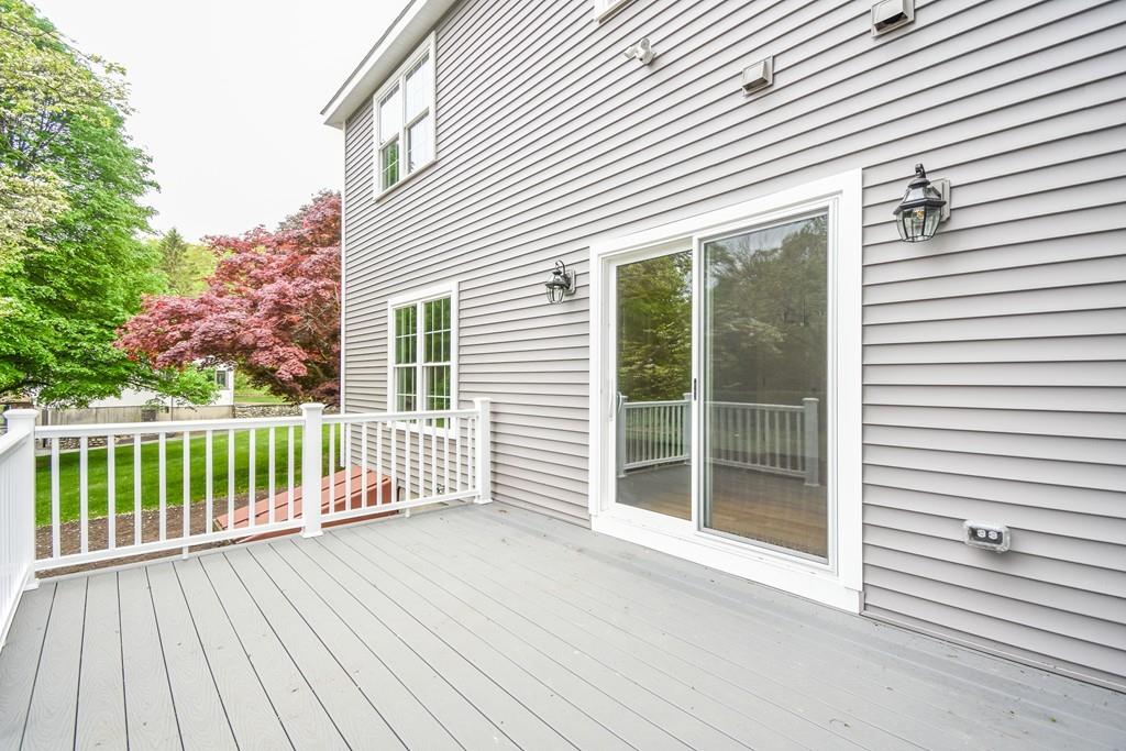 72 Bethany Road Framingham, MA 01702 - Photo 8 of 41 a view of backyard with deck and wooden floor