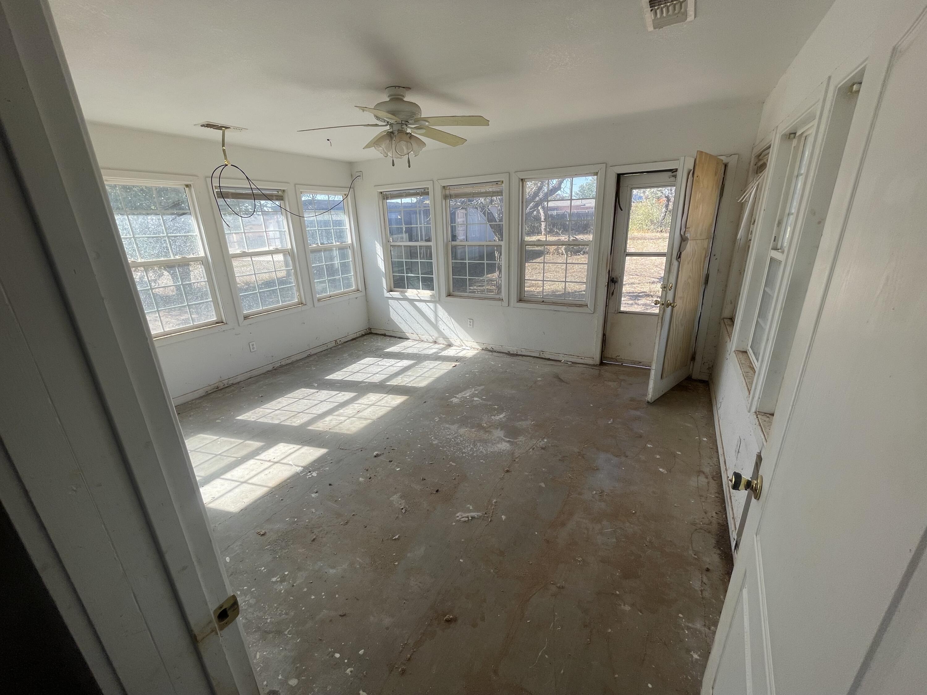 101 S Avenue Post, TX 79356 - Photo 11 of 19 a view of livingroom with window