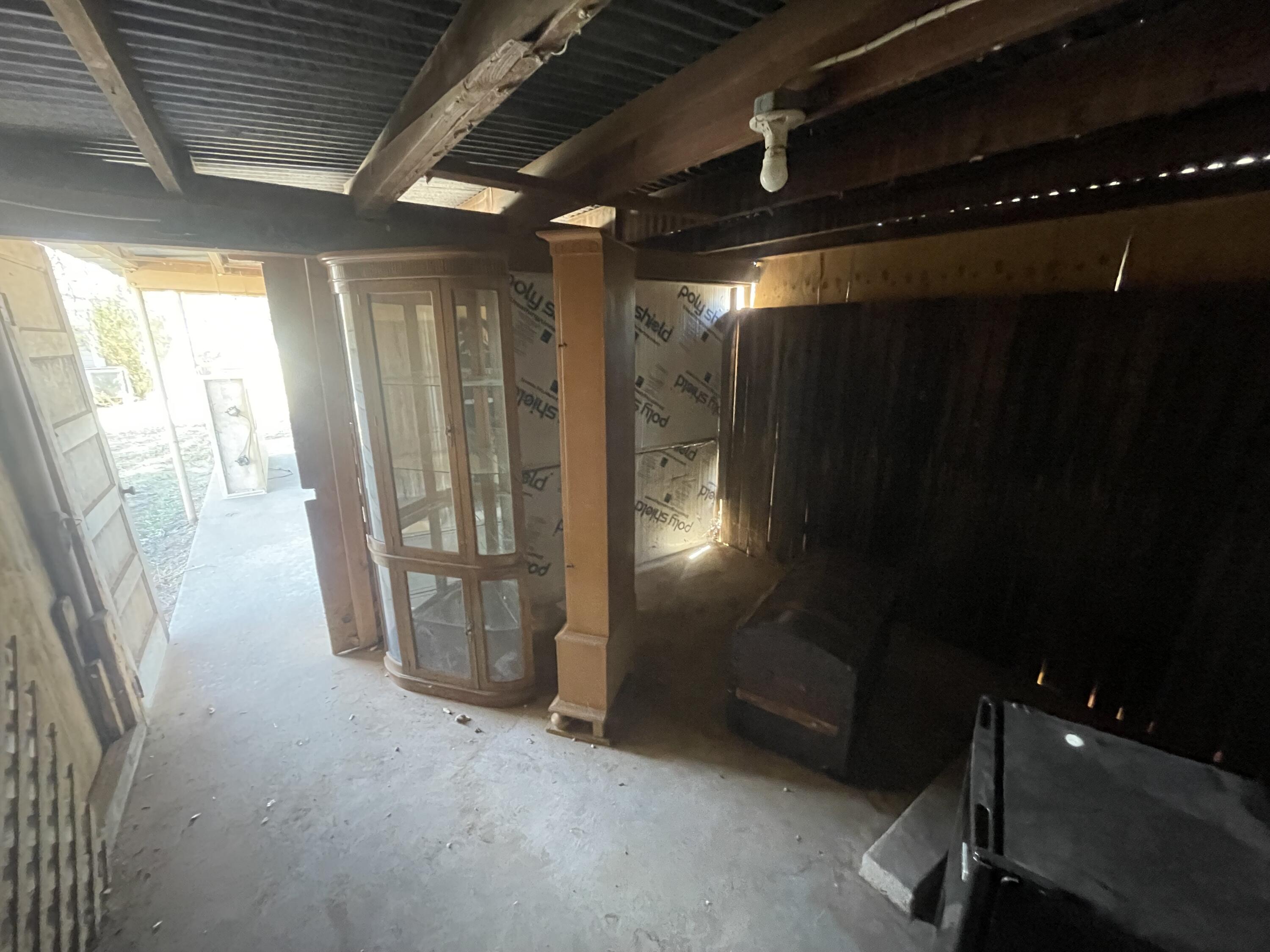 101 S Avenue Post, TX 79356 - Photo 16 of 19 a view of a room with water heater and windows