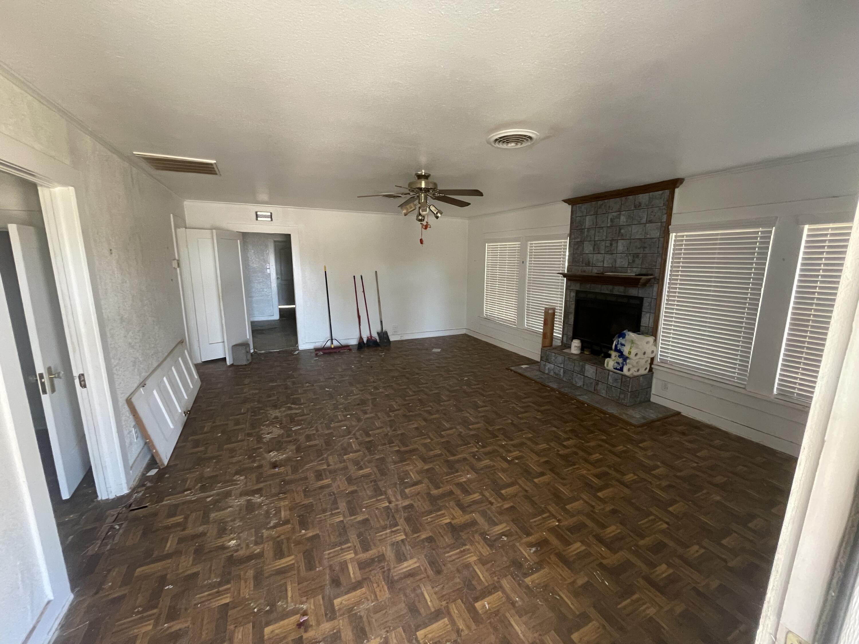 101 S Avenue Post, TX 79356 - Photo 2 of 19 a view of a livingroom with a fireplace